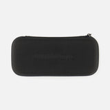 A rectangular black zippered case with rounded edges, subtly embossed with "UNIMATIC" on the front, designed to mirror the refined aesthetic of the Italian-made UNIMATIC UT1-IP Chromatic Trilogy Watch. The case features a minimalist design, with no additional markings or decorations.