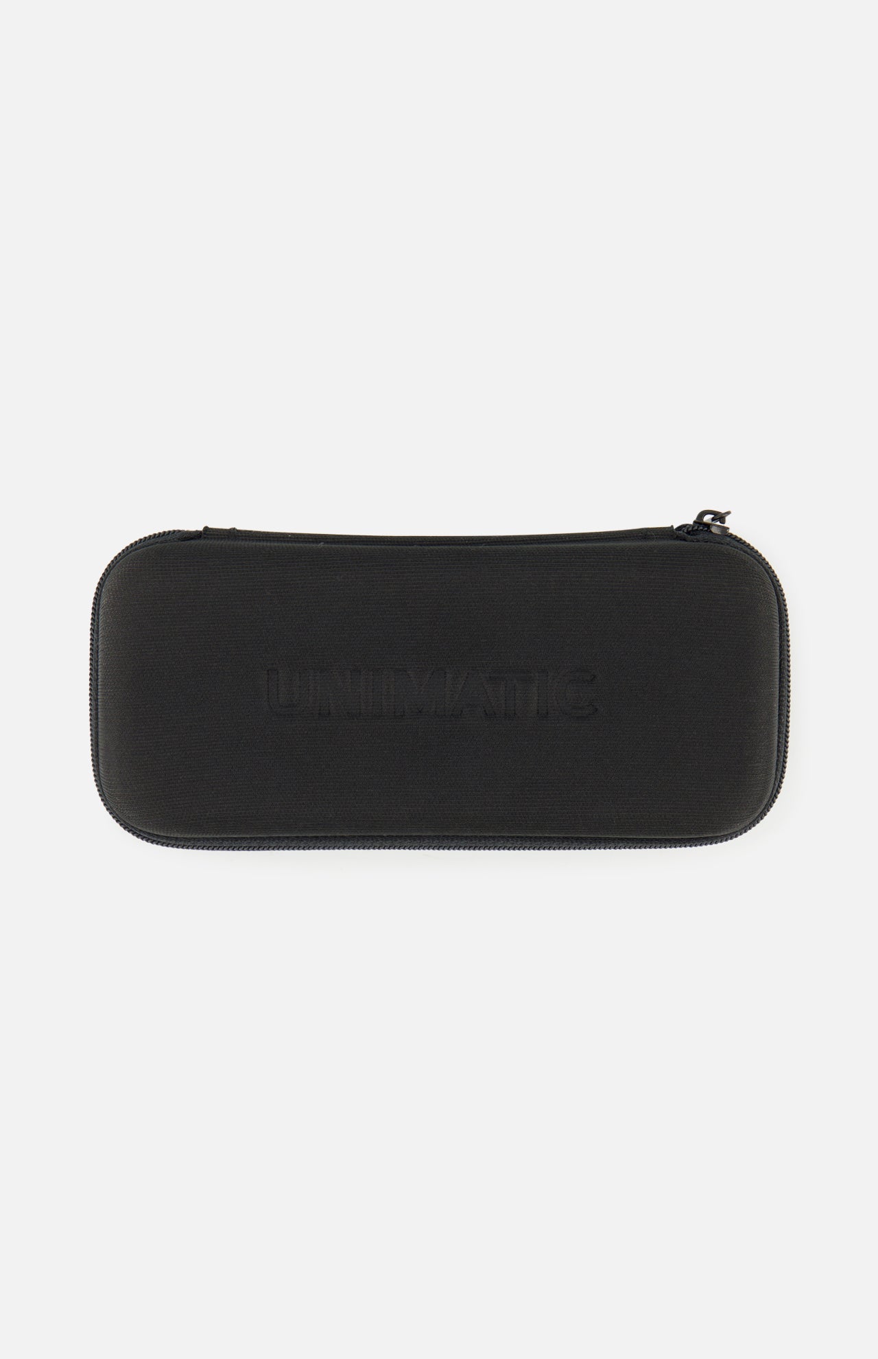 A rectangular black zippered case with rounded edges, subtly embossed with "UNIMATIC" on the front, designed to mirror the refined aesthetic of the Italian-made UNIMATIC UT1-IP Chromatic Trilogy Watch. The case features a minimalist design, with no additional markings or decorations.