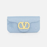 The VALENTINO GARAVANI Loco Swarovski Crystal Clutch features sparkling crystals and a flap closure, finished with a bold VLogo Signature—an elegant designer purse perfect for any occasion.