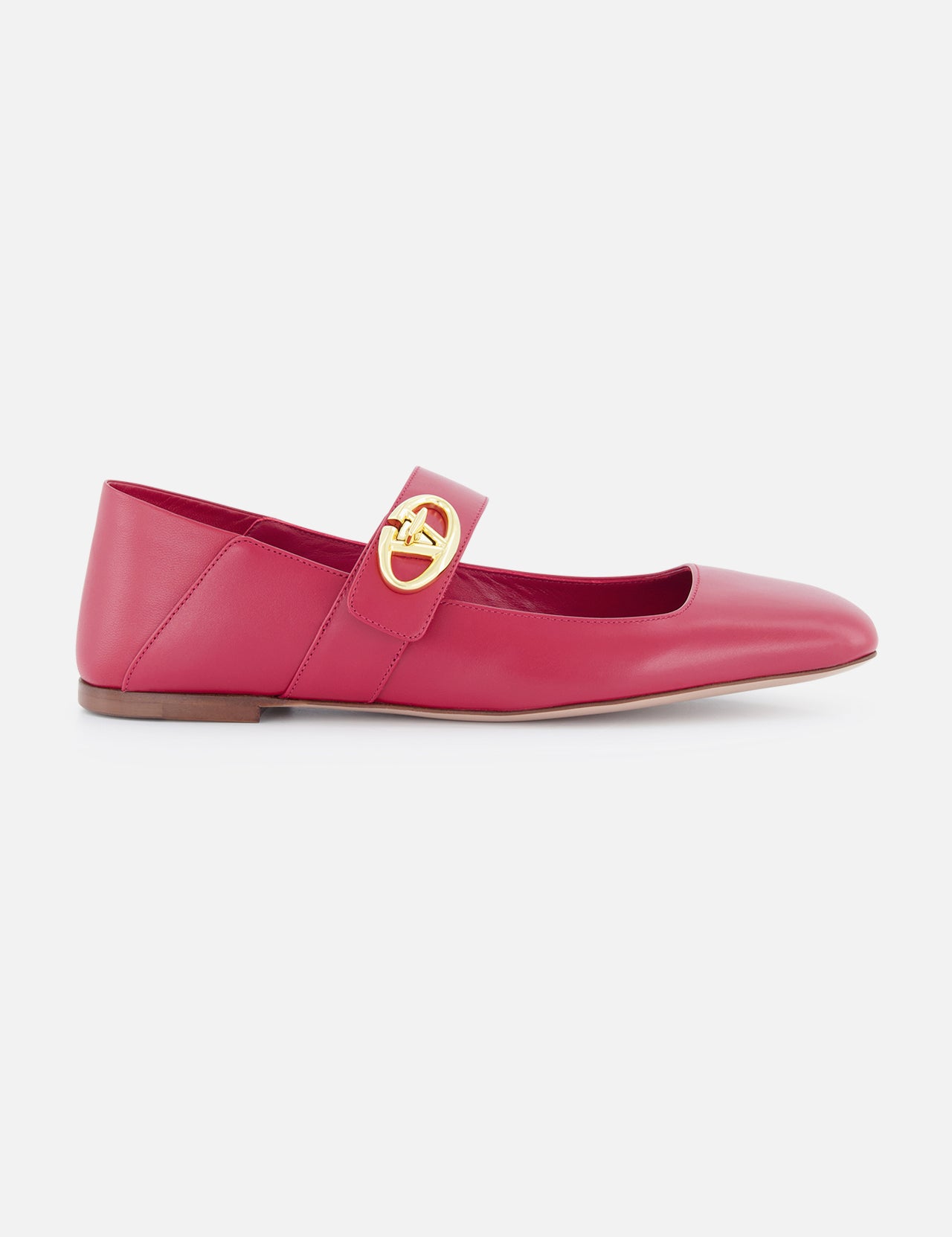 A side view of the VALENTINO GARAVANI V Logo Locker Ballerina in pink leather, featuring a thin sole, collapsible heel, and a top strap with a gold circular buckle.
