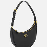 The VALENTINO GARAVANI V Logo Signature Mini Hobo Bag is a black leather crescent-shaped bag with a short adjustable strap, gold zipper, and gold logo detail on the front, shown against a plain white background.