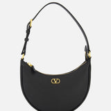 The VALENTINO GARAVANI V Logo Signature Mini Hobo Bag features black leather, a crescent shape, single adjustable strap, gold-tone hardware, and a gold Valentino logo on the front, shown against a plain white background.