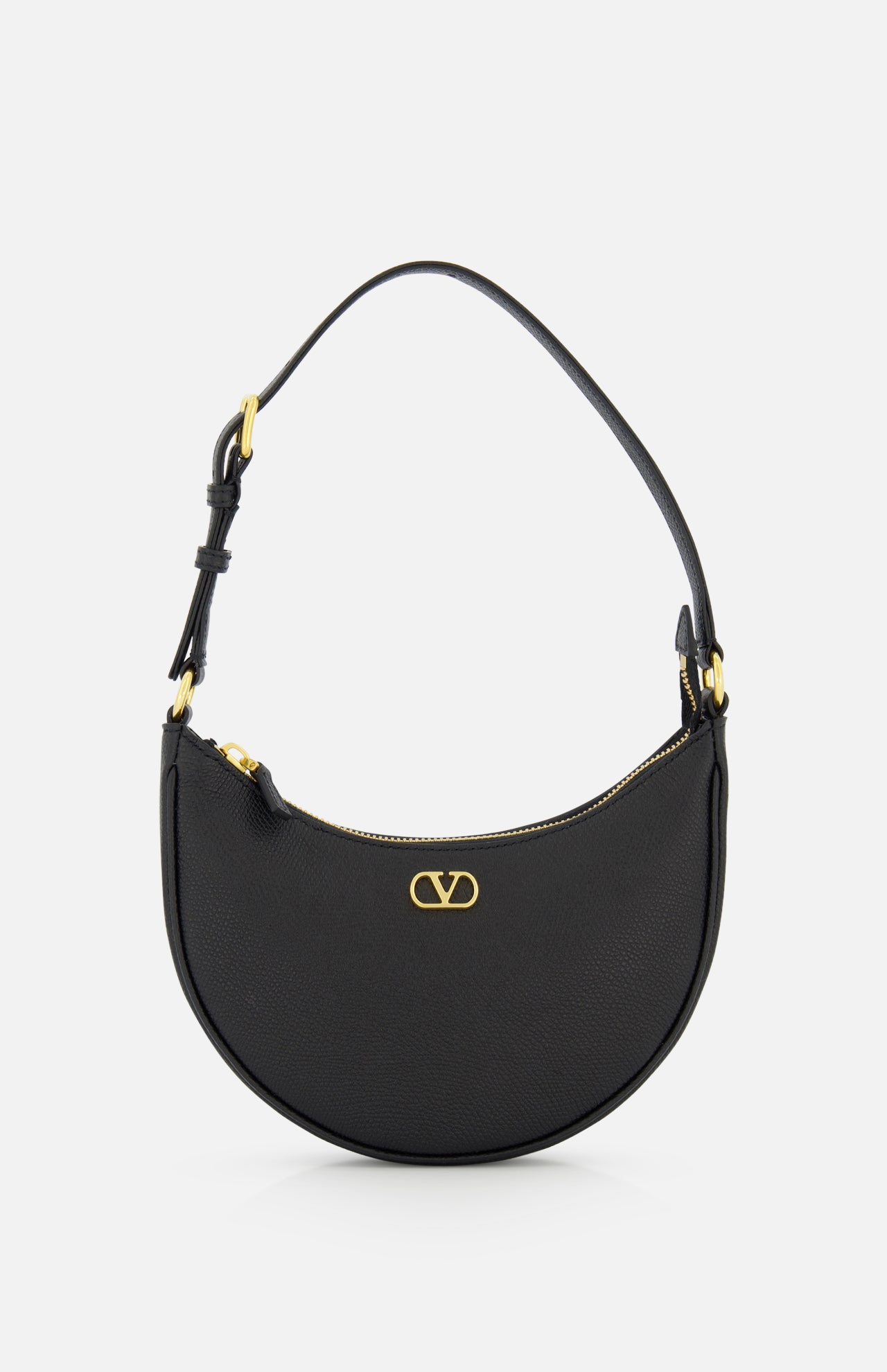 The VALENTINO GARAVANI V Logo Signature Mini Hobo Bag features black leather, a crescent shape, single adjustable strap, gold-tone hardware, and a gold Valentino logo on the front, shown against a plain white background.
