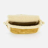 The VALENTINO GARAVANI Alltime Suede Shoulder Bag is a small tan and cream bag with gold hardware, a snap button closure, an inner pocket, and a roomy main compartment for your essentials.