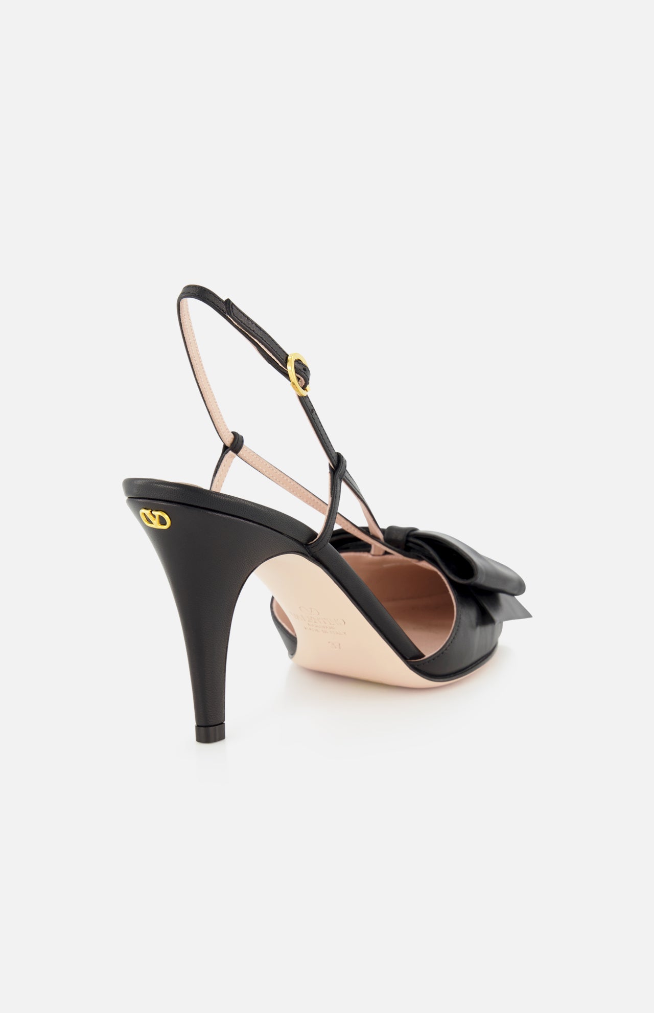 The Bowow Sling Back Heel by VALENTINO GARAVANI is a black leather pointed-toe slingback pump with bow detail, gold logo on the heel side, and an adjustable ankle strap for a secure fit.