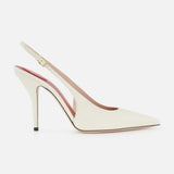 The VALENTINO GARAVANI Cuttie Sling Back Heel is an ivory leather shoe with a pointed toe, stiletto heel, and adjustable ankle strap, shown on a plain white background.