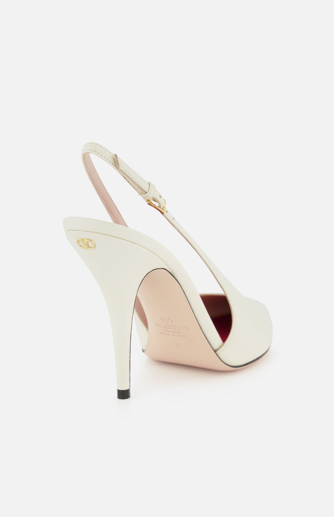 The VALENTINO GARAVANI Cuttie Sling Back Heel, in ivory leather with a pointed toe, gold buckle, gold logo on the heel, and light pink insole, is shown against a plain white background.