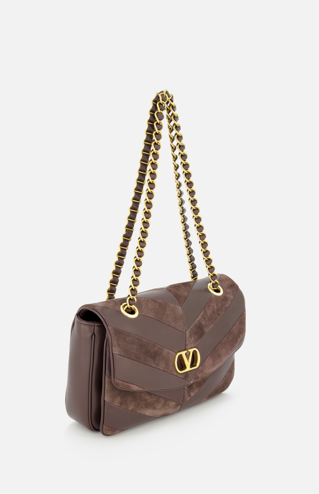 The Djuna Medium Chevron Shoulder Bag by VALENTINO GARAVANI, crafted from brown leather and suede with a gold clasp and chain strap, is displayed against a white background.