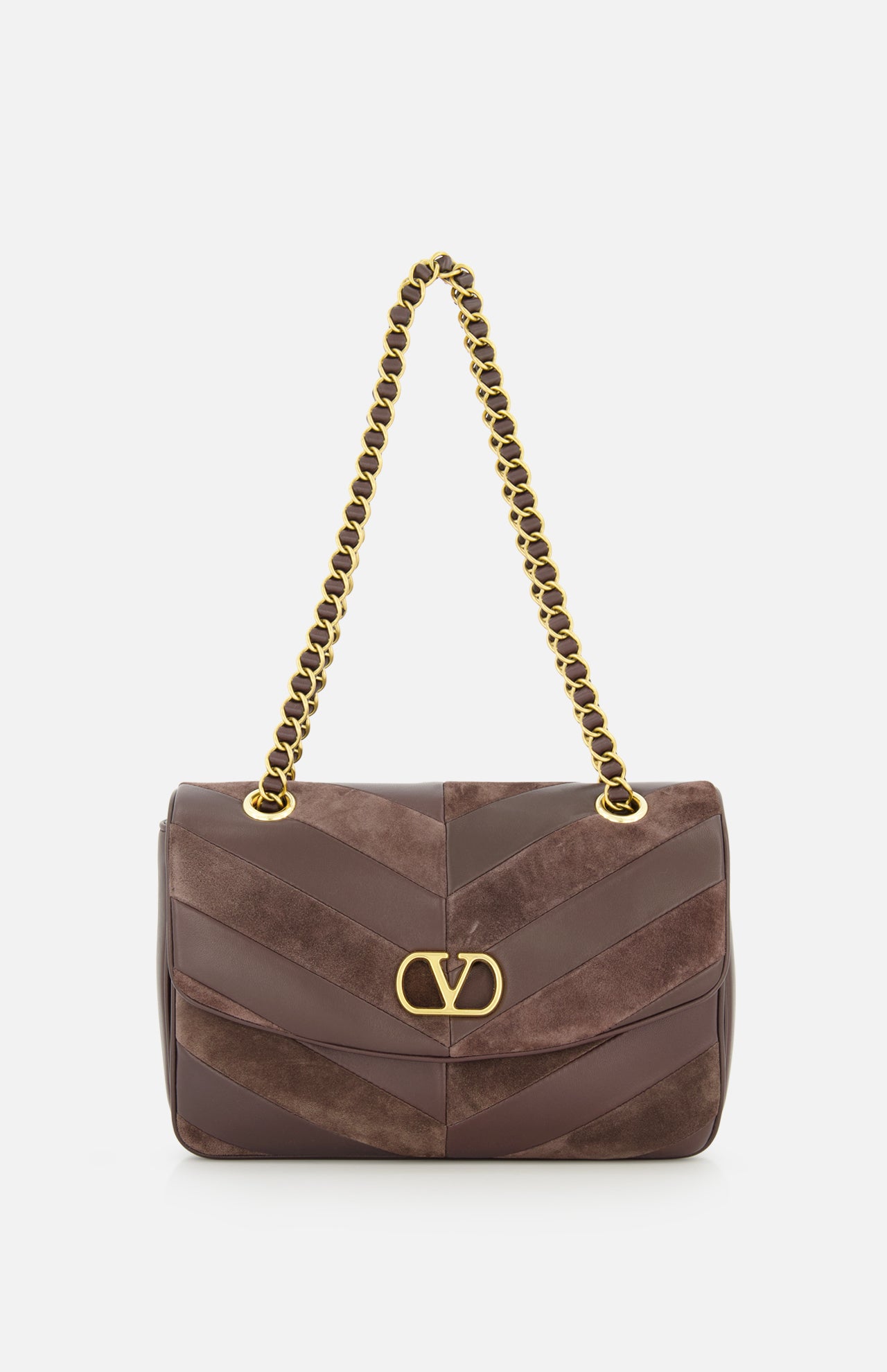 The Djuna Medium Chevron Shoulder Bag by VALENTINO GARAVANI is a brown designer leather shoulder bag with gold chain strap and gold logo clasp, featuring diagonal suede and leather panels, shown against a white background.