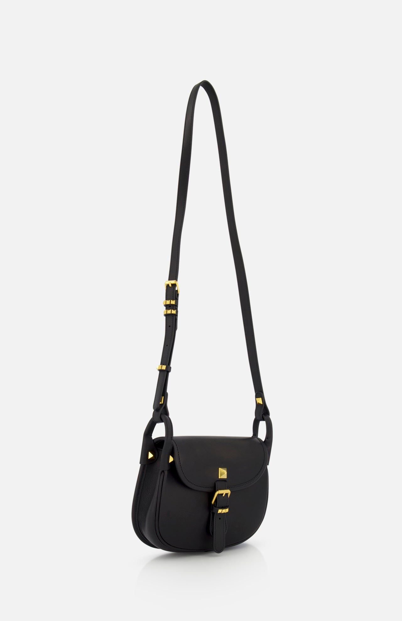 The VALENTINO GARAVANI Flaneuse Small Shoulder Bag features black leather, a flap closure, gold-tone metal buckle, and adjustable shoulder strap. Stylish and versatile, it's perfect for any occasion. Shown on a plain light background.