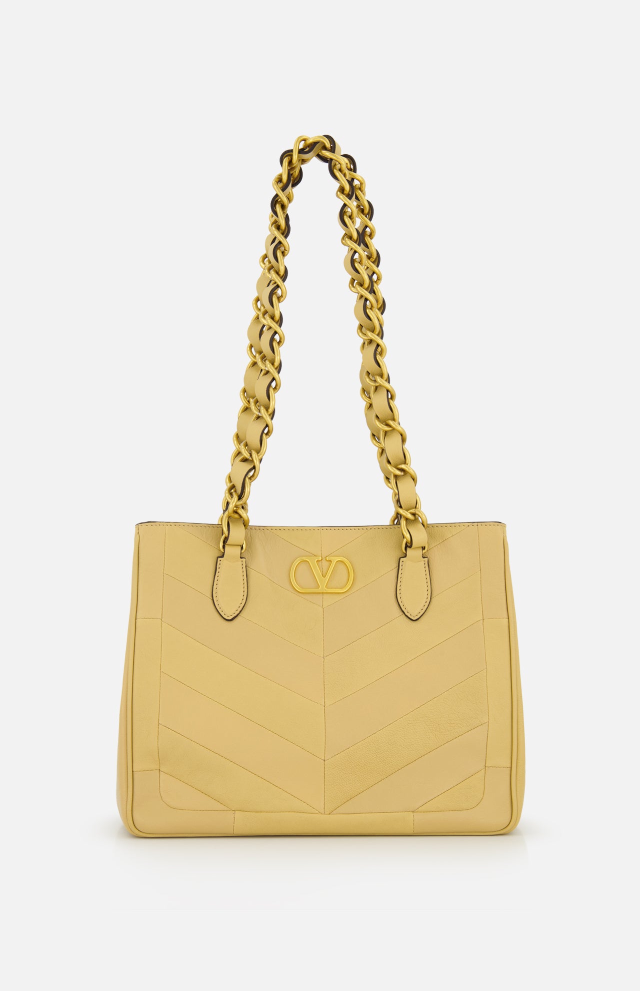 The VALENTINO GARAVANI Laseine Small Tote Bag in yellow features a quilted chevron pattern, gold chain handles, and a gold front emblem, displayed against a plain white background.