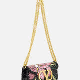 The VALENTINO GARAVANI Loco Small Shoulder Bag is a sparkling sequined minaudière adorned with pink and green sequins, a prominent gold V logo on the front flap, and a gold chain strap—making it the perfect evening bag for any glamorous occasion.