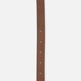 The VALENTINO GARAVANI Mini VLogo Signature Belt H.20 is expertly crafted in Italy from dark brown leather, featuring visible edge stitching and five center holes. Accented with a sophisticated gold-tone buckle and a pointed decorative tip, this accessory exemplifies timeless style and exceptional craftsmanship.