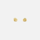 The VALENTINO GARAVANI Ovalette Logo Earrings are small, gold-tone earrings with an interlocking V design, crafted in Italy, shown on a plain white background.