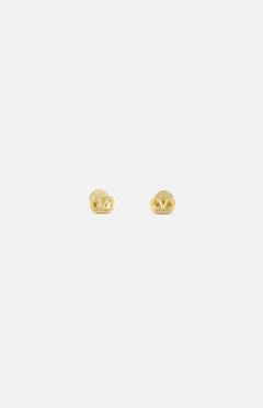 The VALENTINO GARAVANI Ovalette Logo Earrings are small, gold-tone earrings with an interlocking V design, crafted in Italy, shown on a plain white background.