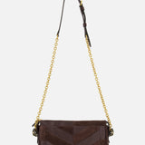 The VALENTINO GARAVANI Panthea Small Patchwork Shoulder Bag is a dark brown design crafted from suede and leather, showcasing a chevron pattern embellished with subtle Swarovski crystals. It features a gold chain strap and an adjustable leather shoulder pad, displayed against a plain white background.