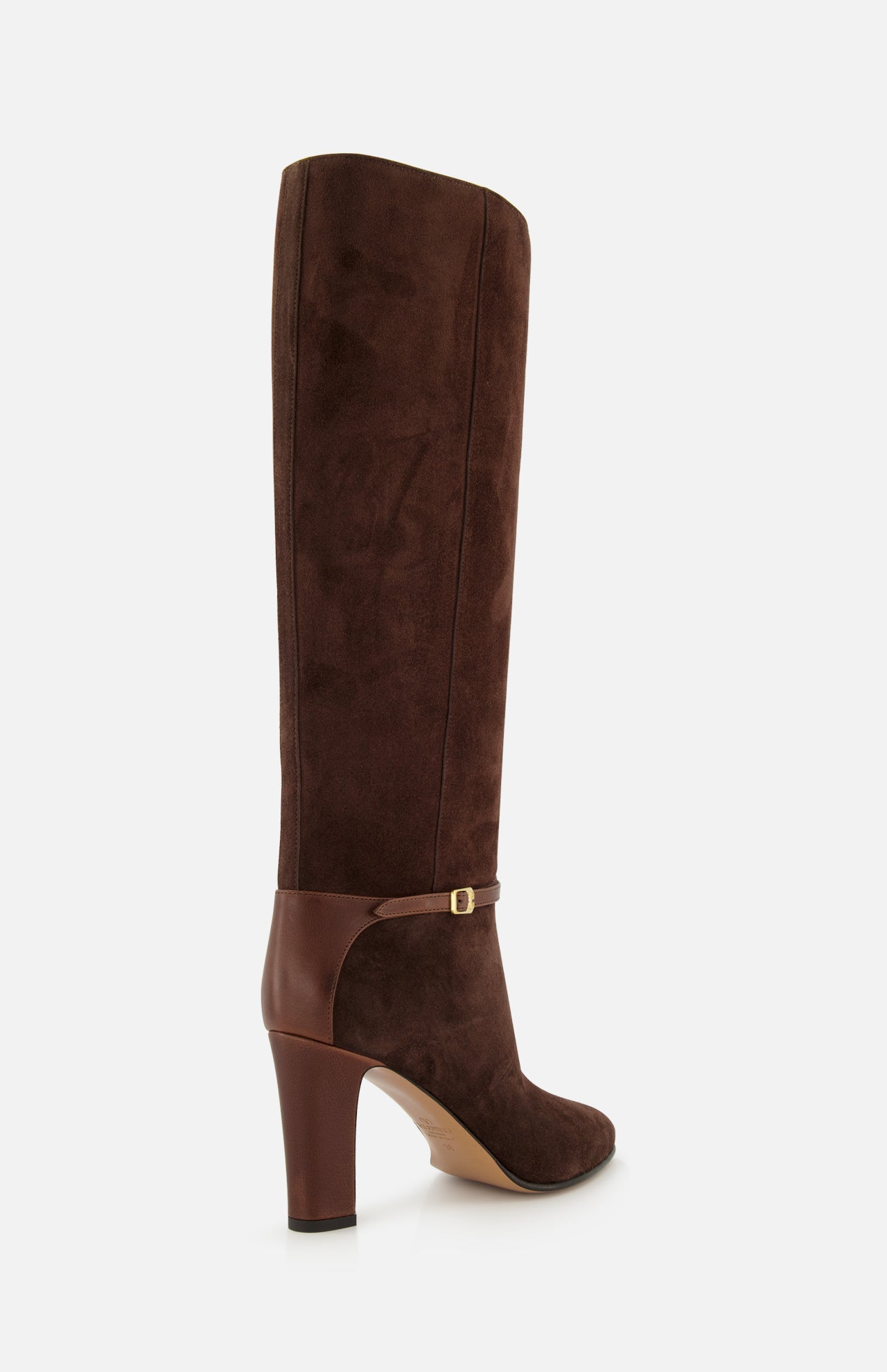 The VALENTINO GARAVANI Pattie Suede Ankle Strap Boot is a tall brown suede and leather equestrian-style boot featuring a rounded toe and an ankle strap with a small buckle, shown against a white background.