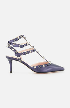 The VALENTINO GARAVANI Rockstud Ankle Strap Heel features a navy blue pointed toe, silver studs, and multiple adjustable buckled ankle straps, shown against a plain white background.