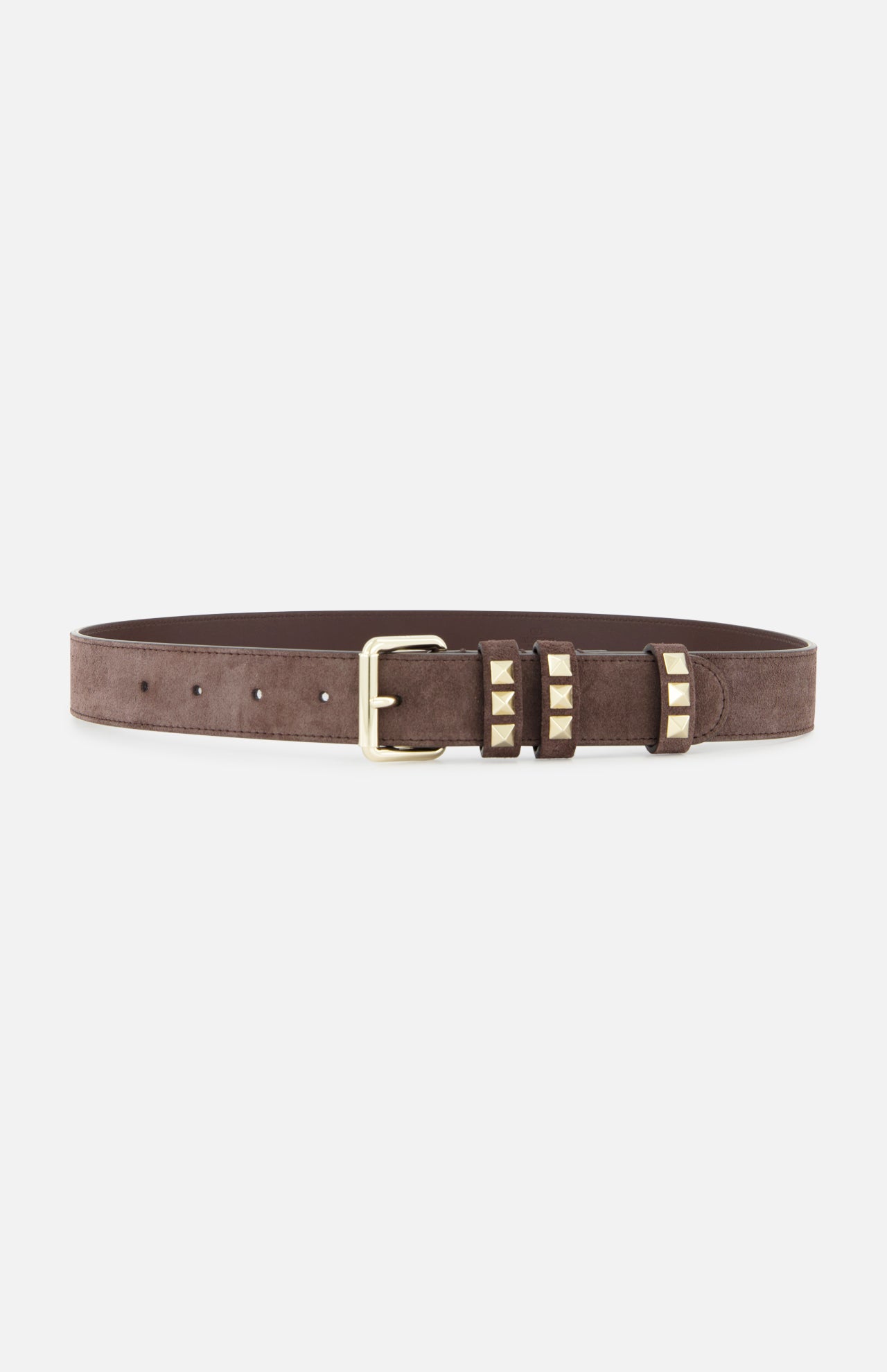 The VALENTINO GARAVANI Rockstud Belt H. 30 features dark brown suede, a gold buckle, and gold square studs on the loops—an elegant twist on the rockstud belt style, shown against a plain white background.