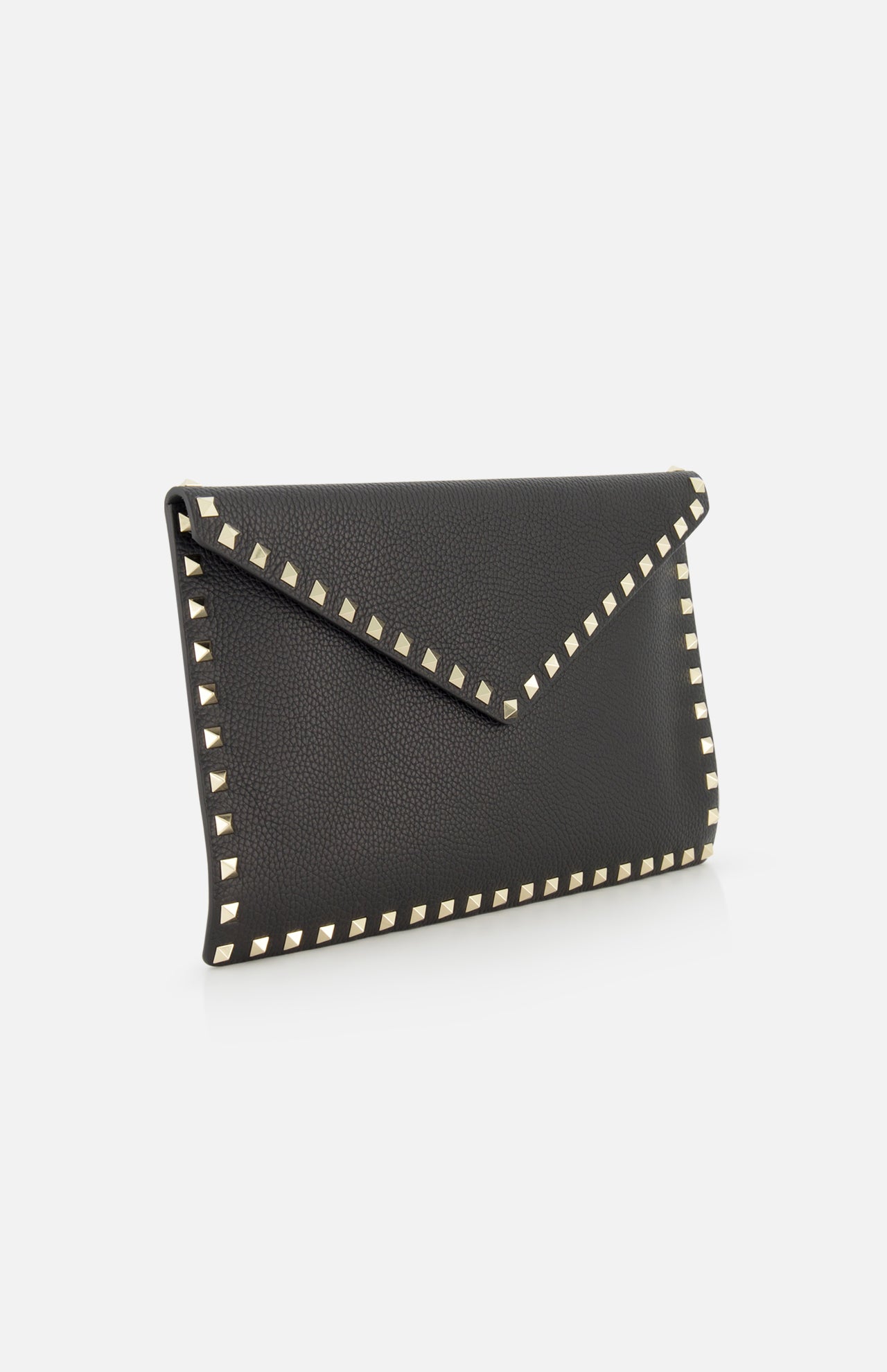 The VALENTINO GARAVANI Rockstud Large Flat Pouch is a black textured leather envelope clutch adorned with gold pyramid studs along the edges, shown against a white background.