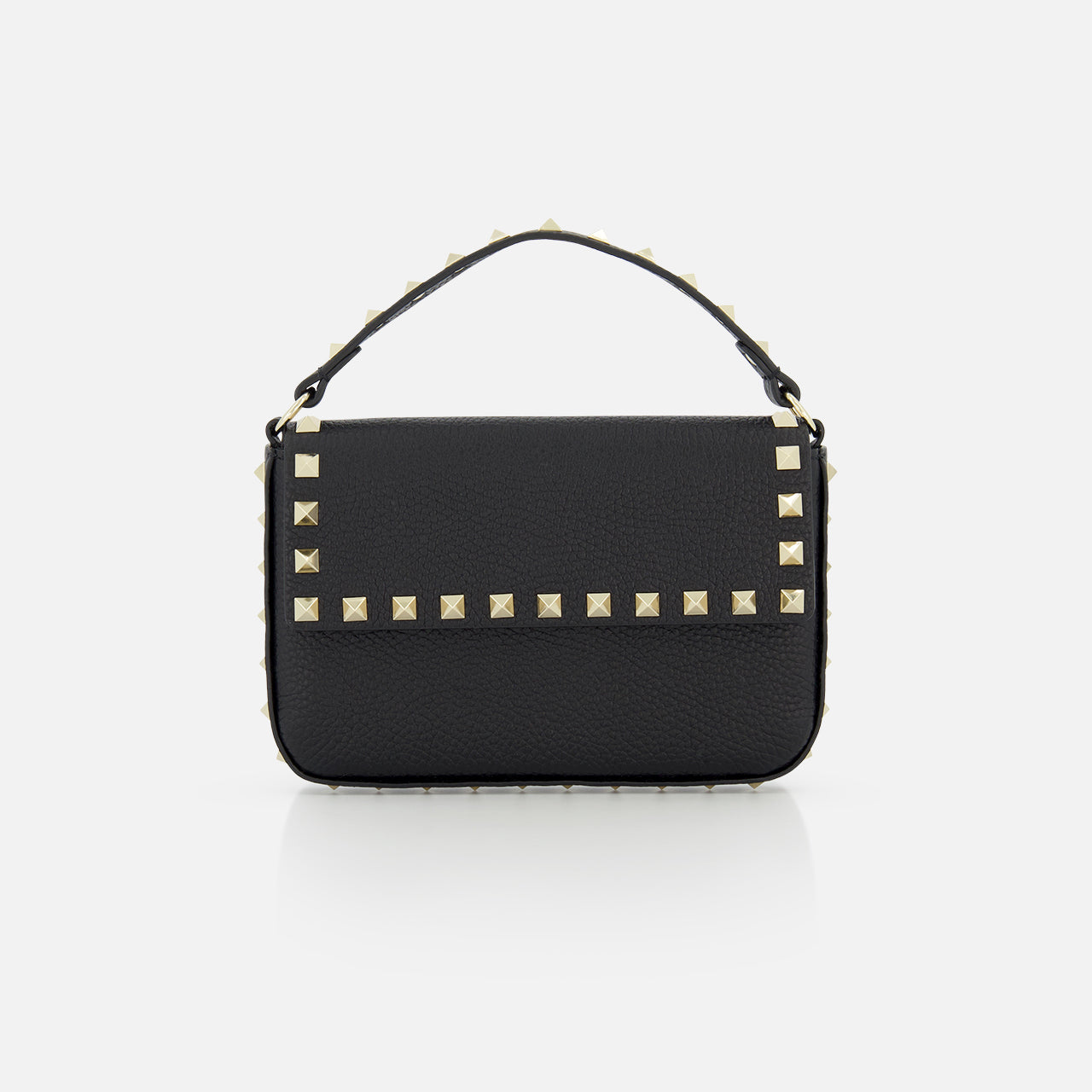 The VALENTINO GARAVANI Rockstud Leather Mini Bag is a black grainy leather mini bag adorned with gold studs for a bold, fashionable look.