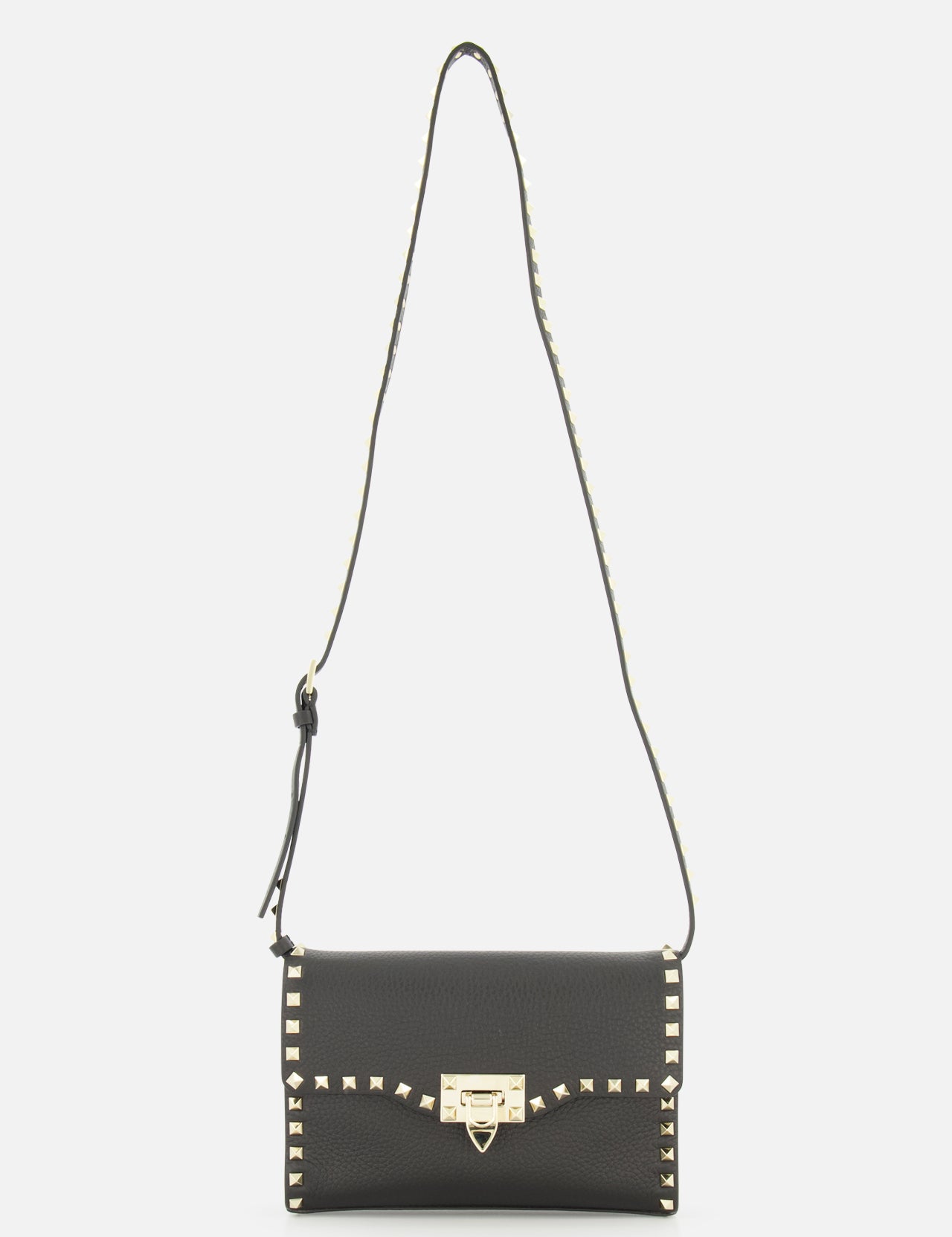 The VALENTINO GARAVANI Rockstud Small Shoulder Bag is crafted from black Italian leather and features gold square studs along the edges, a gold buckle closure at the front, and an adjustable studded strap—an effortlessly chic handbag.