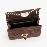 The VALENTINO GARAVANI Rockstud Small Suede Shoulder Bag features brown suede, a gold clasp, striking rockstud trim on the flap, and an interior with compartments and a zippered pocket for elegant organization.