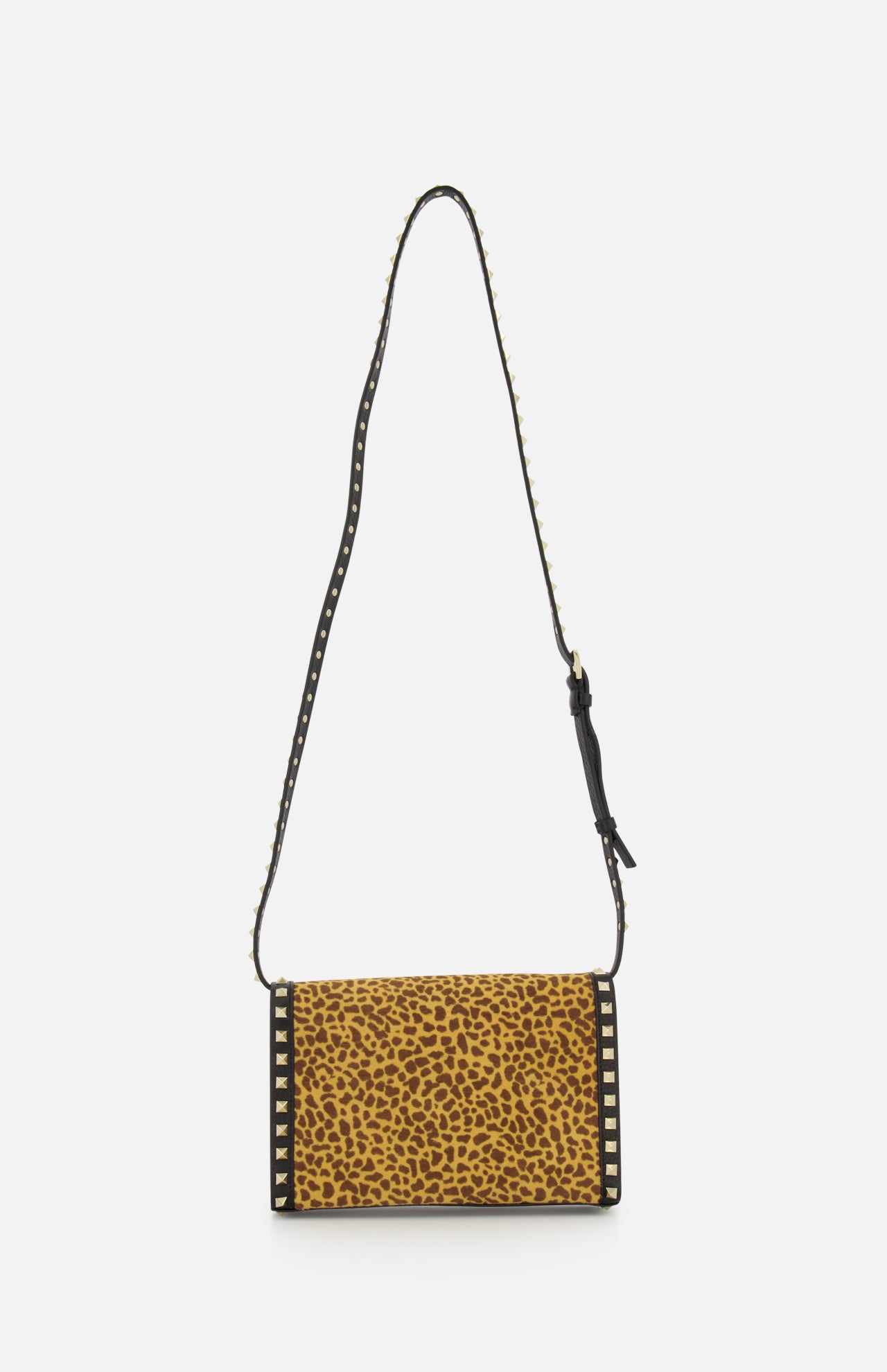 The Rockstud Small Leopard Print Shoulder Bag by VALENTINO GARAVANI features a rectangular shape, pony-effect calfskin flap, black trim, gold rockstuds on the edges, and a long black strap embellished with small gold studs.