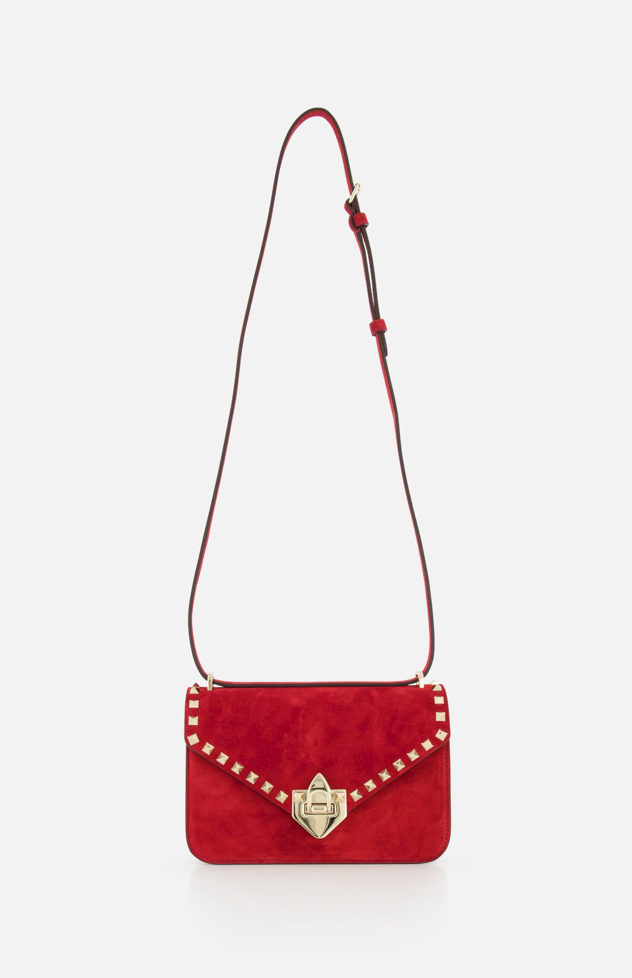 The VALENTINO GARAVANI Rockstud Small Suede Shoulder Bag in lipstick red features gold-tone rockstud trim, a gold clasp, and an adjustable brown leather strap, shown on a plain white background.