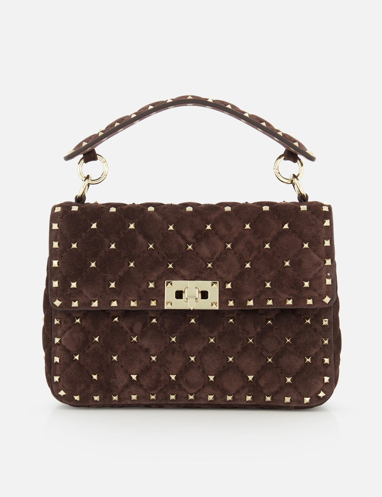 The VALENTINO GARAVANI Rockstud Spike Medium Shoulder Bag features dark brown quilted suede adorned with signature gold micro rockstuds, a top handle, and a gold rectangular clasp on the front flap.