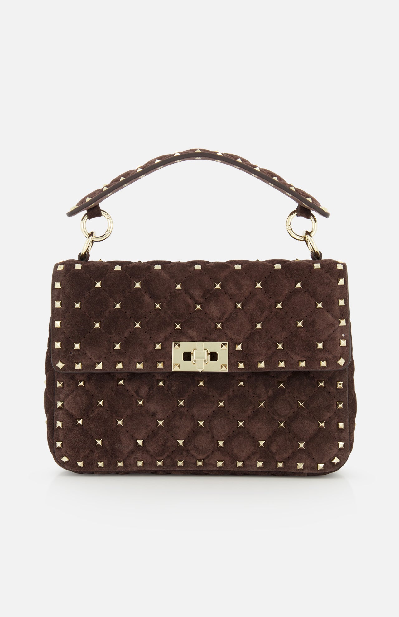 The VALENTINO GARAVANI Rockstud Spike Medium Shoulder Bag features dark brown quilted suede adorned with signature gold micro rockstuds, a top handle, and a gold rectangular clasp on the front flap.