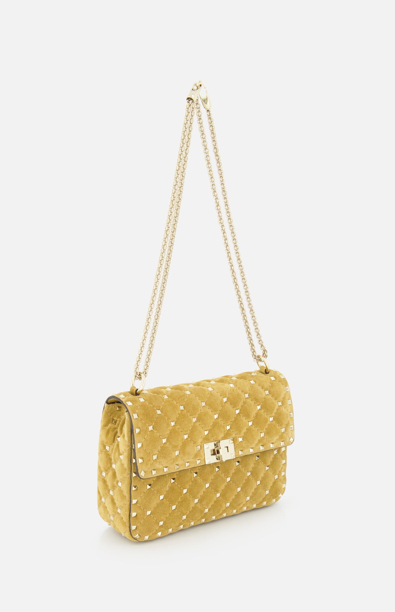 VALENTINO GARAVANI Rockstud Spike Medium Shoulder Bag in yellow, featuring gold studs, a detachable chain strap, and a rectangular gold clasp, displayed on a white background—a stylish quilted handbag perfect for elevating any look.