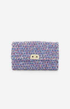 The Rockstud Spike Shoulder Bag by VALENTINO GARAVANI is a rectangular shoulder bag crafted from textured, multicolored tweed fabric, featuring a gold-tone turn-lock closure and a removable chain strap, displayed against a plain white background.