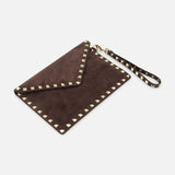 The VALENTINO GARAVANI Rockstud Suede Medium Flat Pouch is a medium-sized dark chocolate brown suede envelope-style wristlet, adorned with gold-tone pyramid studs along the edges and finished with a coordinating wrist strap for that iconic Rockstud trim clutch look.