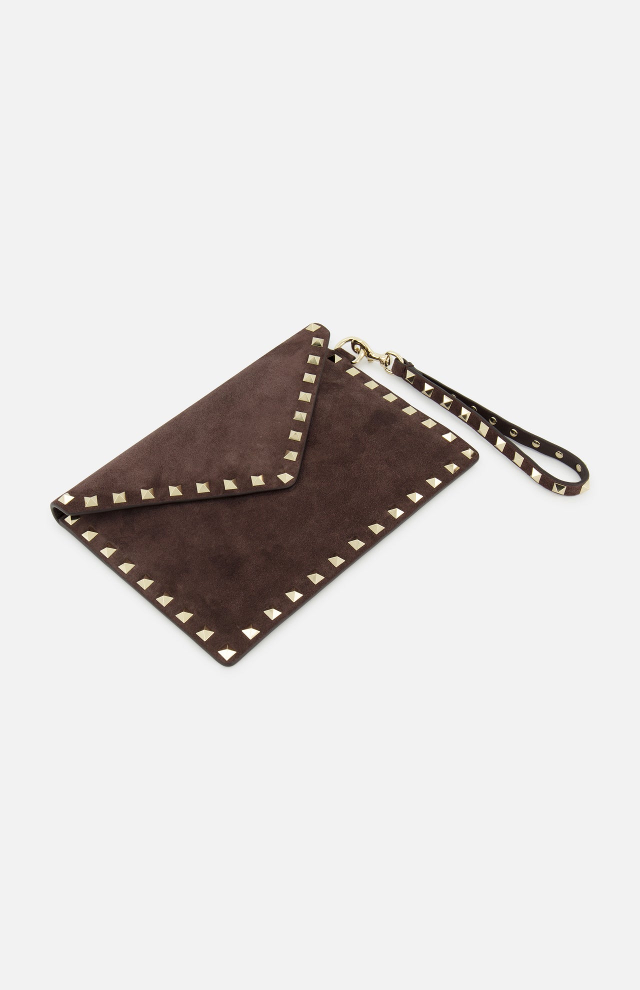 The VALENTINO GARAVANI Rockstud Suede Medium Flat Pouch is a medium-sized dark chocolate brown suede envelope-style wristlet, adorned with gold-tone pyramid studs along the edges and finished with a coordinating wrist strap for that iconic Rockstud trim clutch look.
