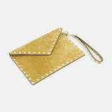 The VALENTINO GARAVANI Rockstud Suede Medium Flat Pouch, shown on a white background, features tan suede with gold rockstud trim, a coordinating wrist strap, and a flap closure.