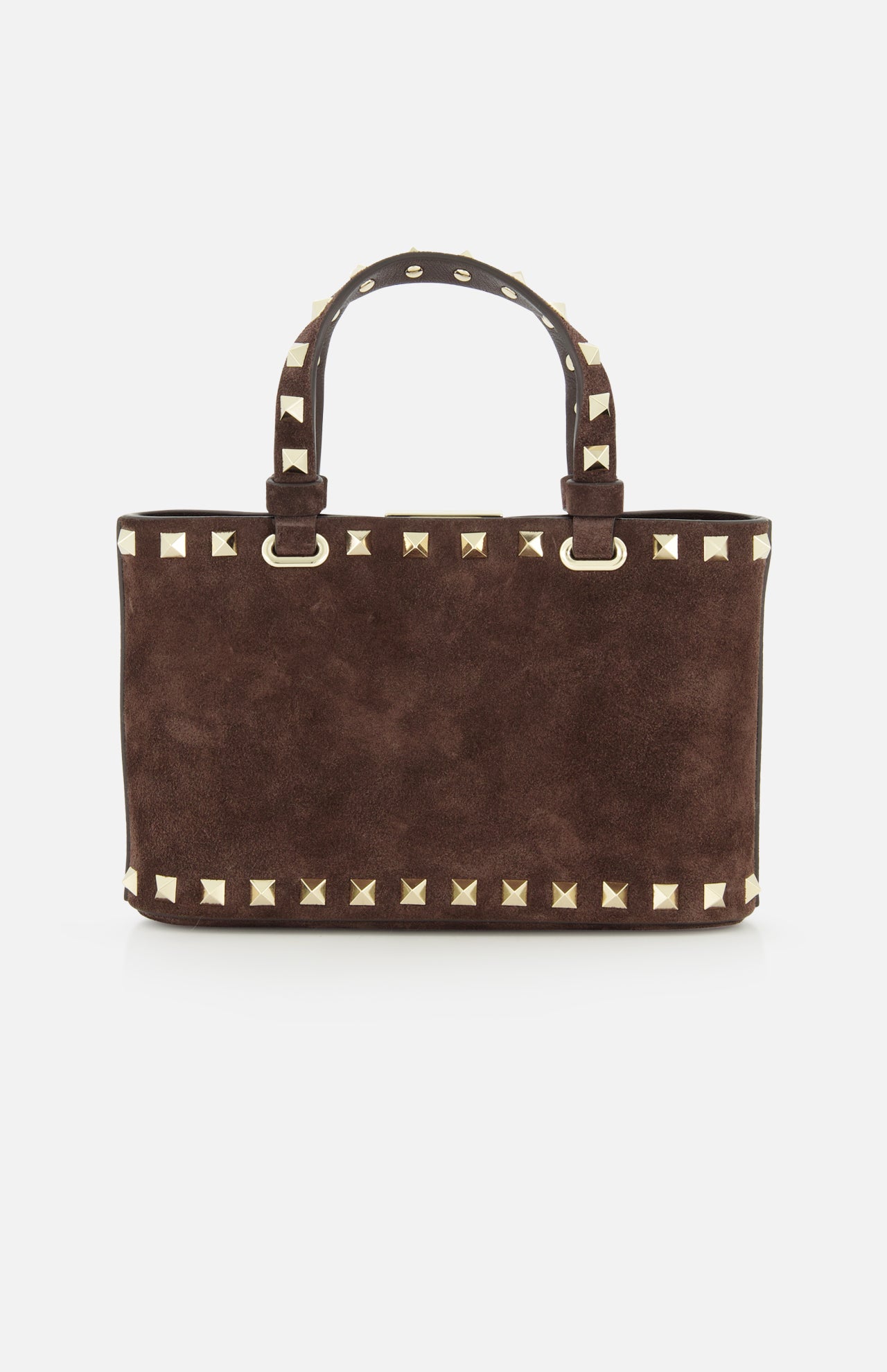 The VALENTINO GARAVANI Rockstud Suede Mini Bag is crafted in a rich dark chocolate brown suede, featuring two handles and distinctive gold square studs accenting the edges and handles. Displayed against a white background, this mini bag also comes with a removable chain strap for versatile styling options.