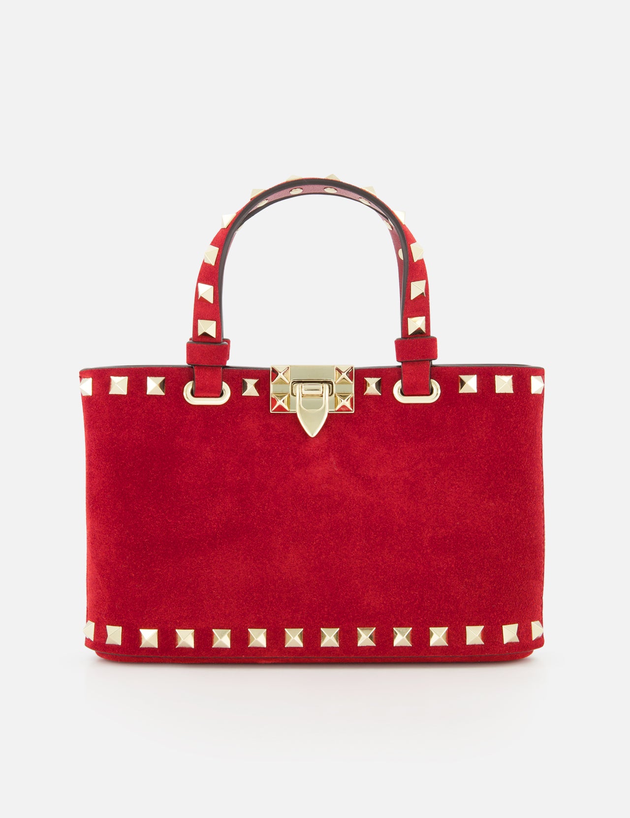 The VALENTINO GARAVANI Rockstud Suede Mini Bag features red suede, gold pyramid studs, dual handles, a detachable chain strap, and a gold clasp closure, shown against a plain white background.