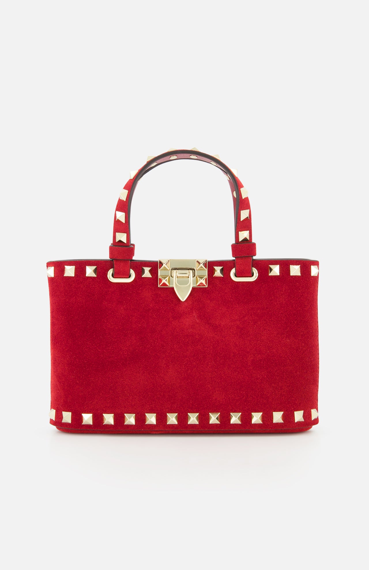 The VALENTINO GARAVANI Rockstud Suede Mini Bag features red suede, gold pyramid studs, dual handles, a detachable chain strap, and a gold clasp closure, shown against a plain white background.
