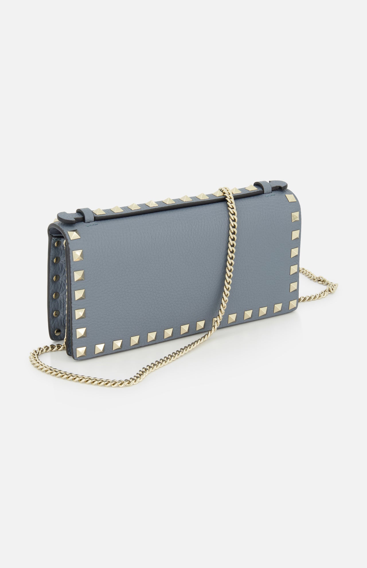The VALENTINO GARAVANI Rockstud Wallet with Chain Strap is a blue leather purse featuring gold pyramid studs along the edges and a gold chain strap, shown on a white background.