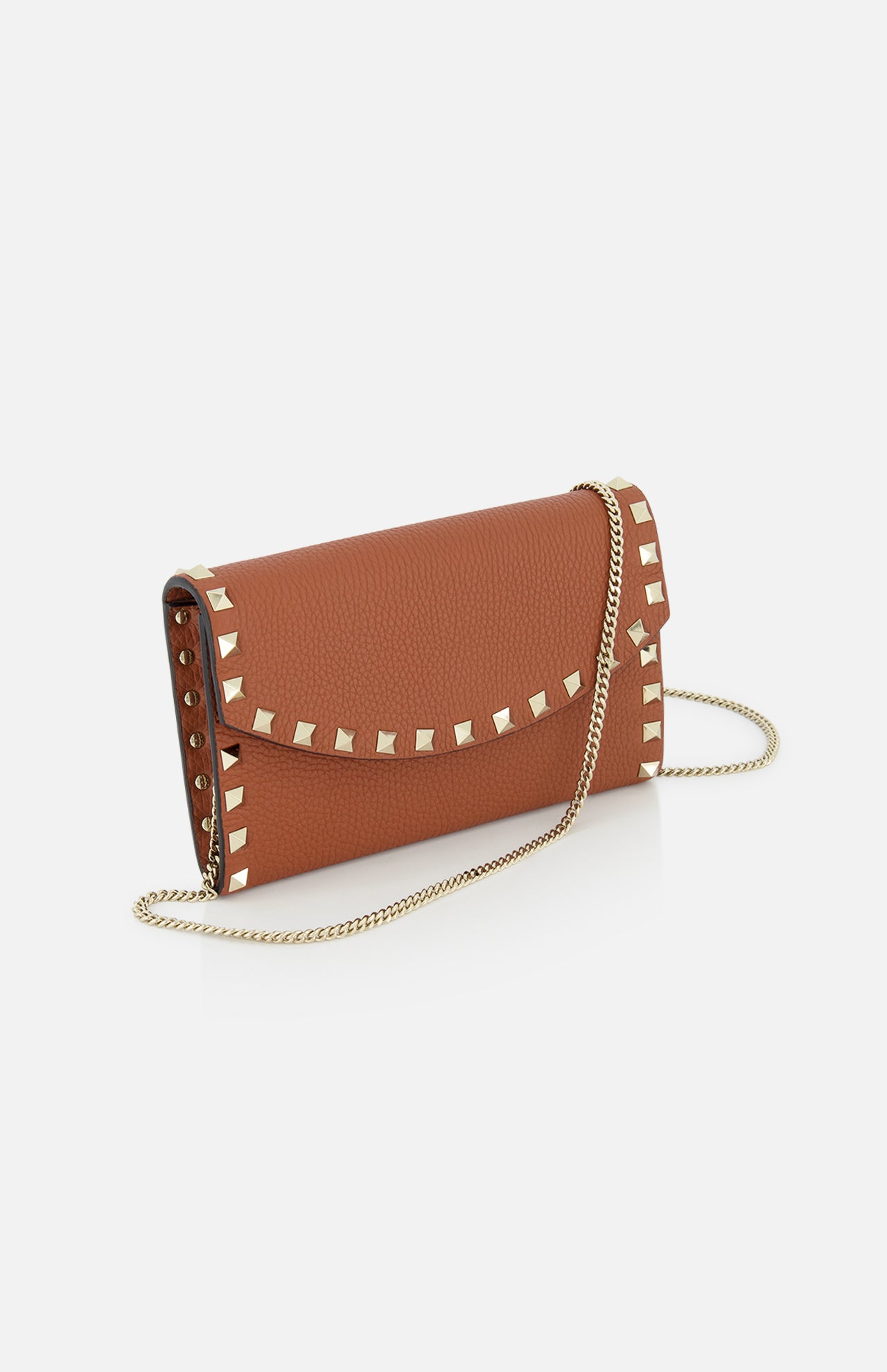 The VALENTINO GARAVANI Rockstud Wallet with Chain Strap is a brown leather mini bag with gold rockstud trim and a gold chain strap, shown against a white background.