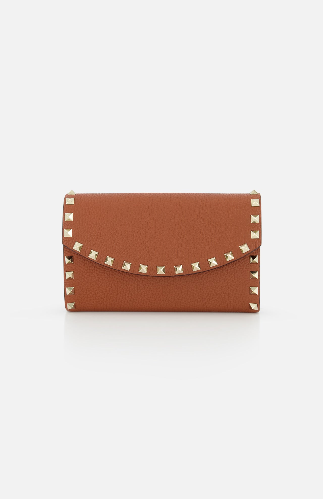 The VALENTINO GARAVANI Rockstud Wallet with Chain Strap is a brown leather mini bag with a wallet-inspired shape, flap closure, and gold rockstud trim along the edges, shown on a plain white background.