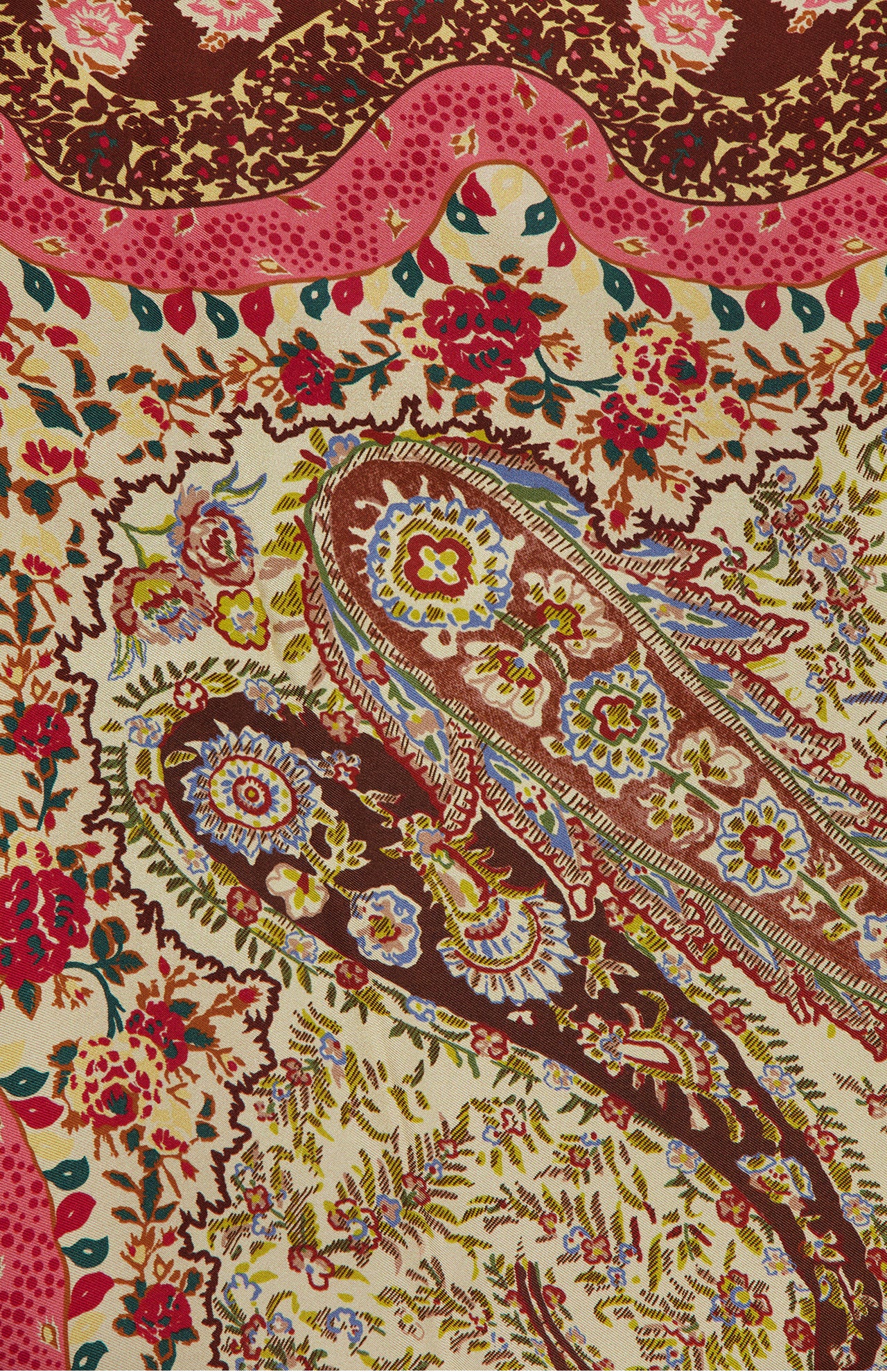 The Shawls Floral Foulard Scarf by VALENTINO GARAVANI features an intricate paisley and floral design in red, brown, blue, yellow, and green on cream, evoking classic elegance ideal for designer accessories or a silk scarf.