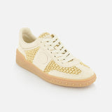 The VALENTINO GARAVANI Upvillage Raffia Sneaker features cream and beige tones with woven gold accents, a lace-up front, and a light tan rubber sole, shown on a white background.