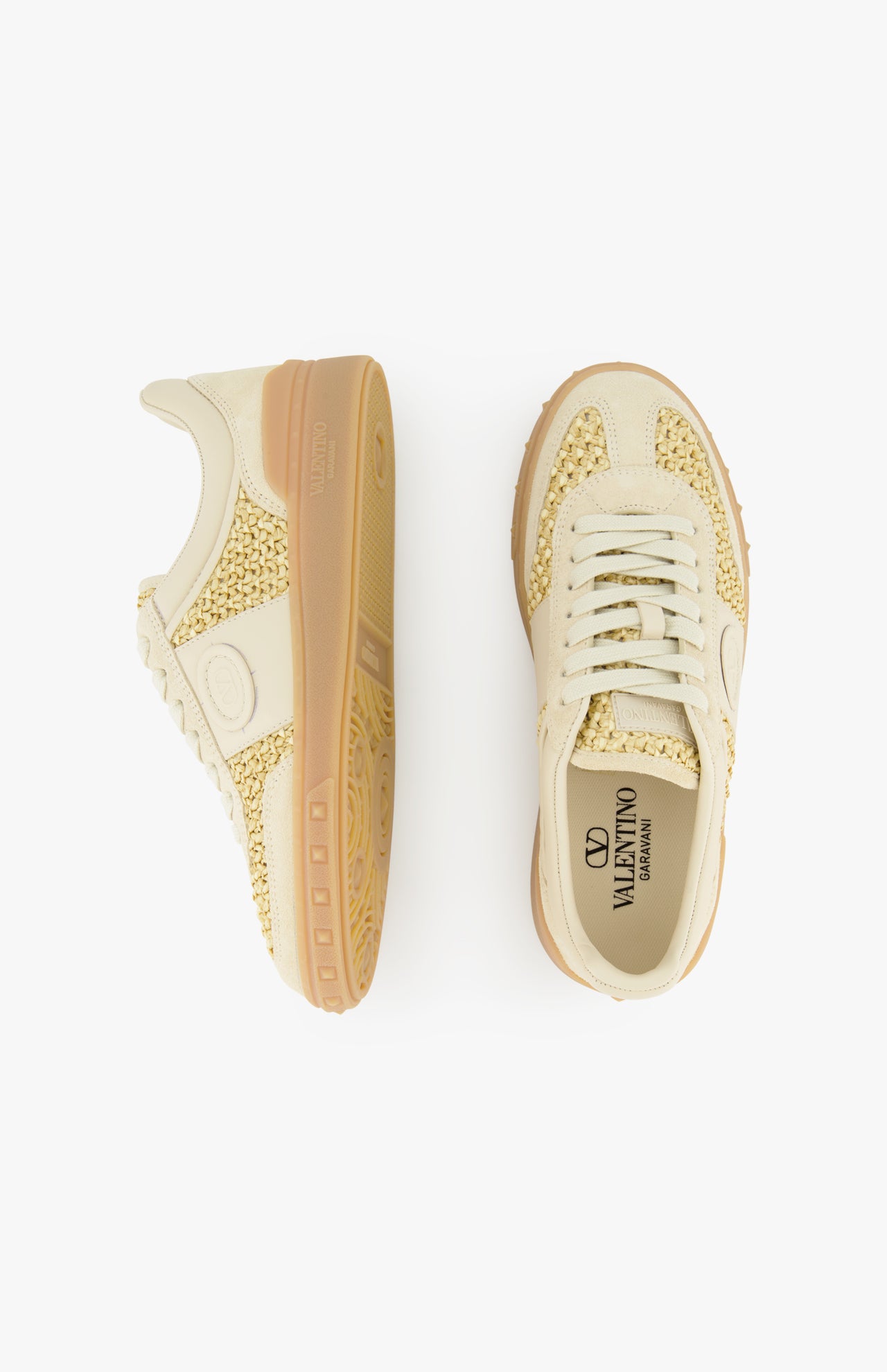 The VALENTINO GARAVANI Upvillage Raffia Sneaker, shown in beige with woven raffia details, tan rubber soles, and cream laces, is displayed in top and side views against a white background.