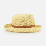 The VALENTINO GARAVANI V Logo Signature Bucket Hat is a light straw hat with a flat top, wide brim, and brown ribbon band around the crown, displayed on a plain white background.