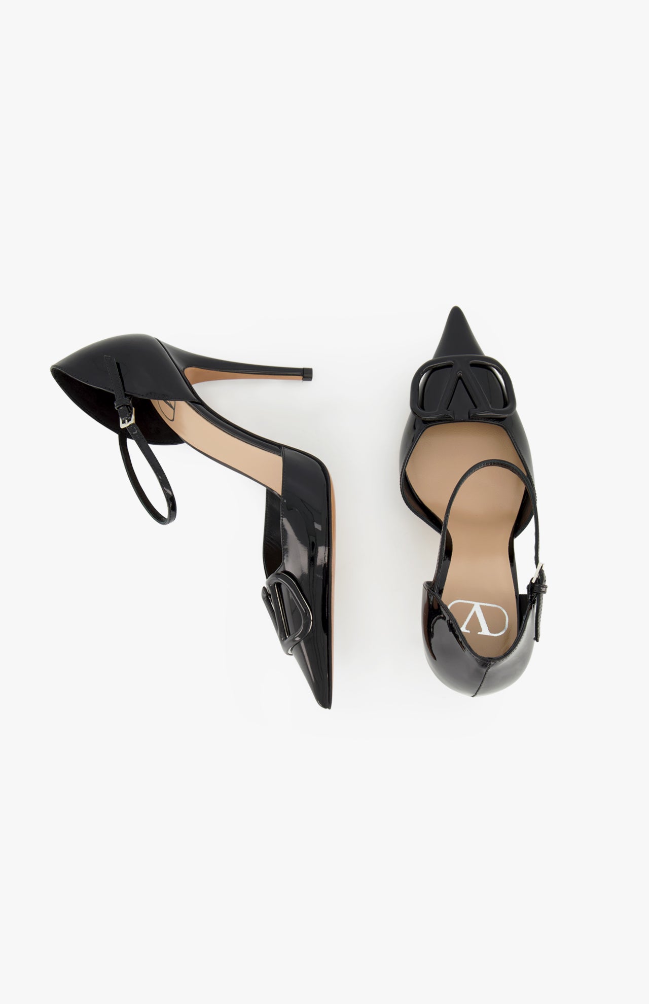 A pair of VALENTINO GARAVANI V Logo Signature D'Orsay Heels in black patent leather with pointed toes, ankle straps, and signature decorative buckles are displayed on a white background.