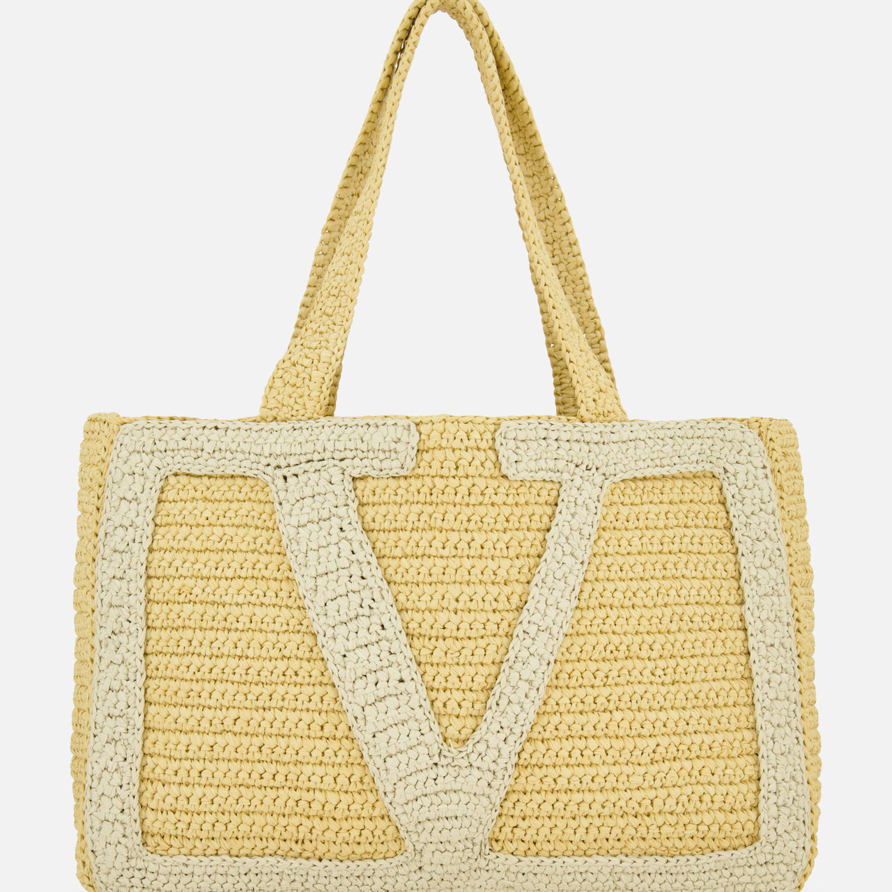 The Viva Superstar Crochet Large Tote Bag by VALENTINO GARAVANI is a woven beige bag with dual handles and a bold light V pattern—perfect as a stylish beach tote for sunny days.