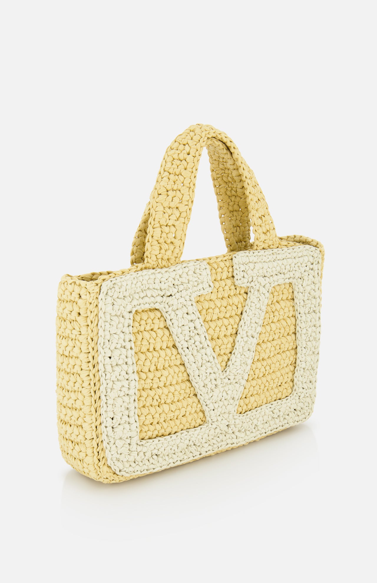 The VALENTINO GARAVANI Viva Superstar Crochet Small Tote Bag features woven straw, two short handles, and a bold white outlined VLogo on the front, shown against a white background.