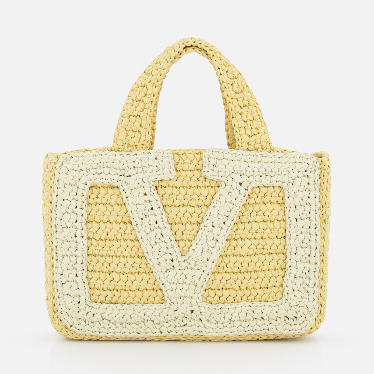 The Viva Superstar Crochet Small Tote Bag by VALENTINO GARAVANI is a yellow synthetic raffia mini tote with two short handles, a large light V pattern on the front, and a textured crochet look on a white background.